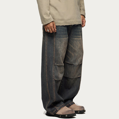“RUSTED” JEANS